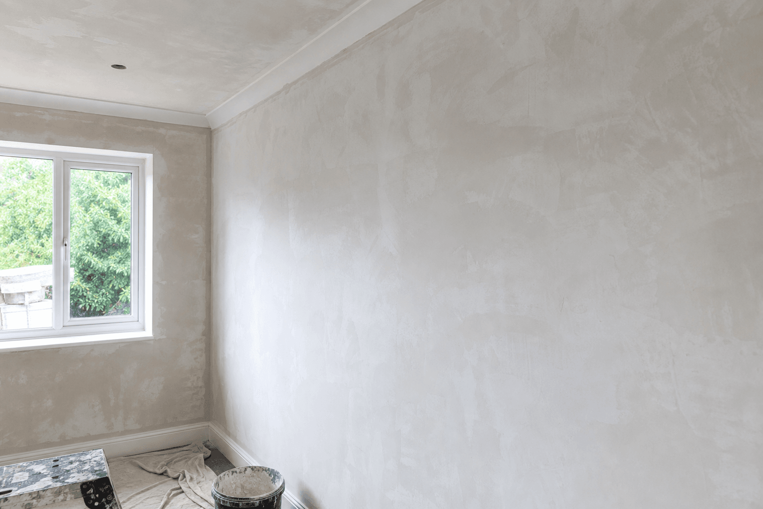 Illustrative image: Why a skim-coated wall still looks rough after painting, and what to fix